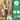 Dog leaping to catch a tennis ball; the launcher supports 1.88 to 1.96 inch tennis balls only