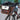 Brown dog bicycle carrier seat mounted on a bike's front handlebars