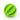 Green rubber dental treat ball showing cleaning ridges
